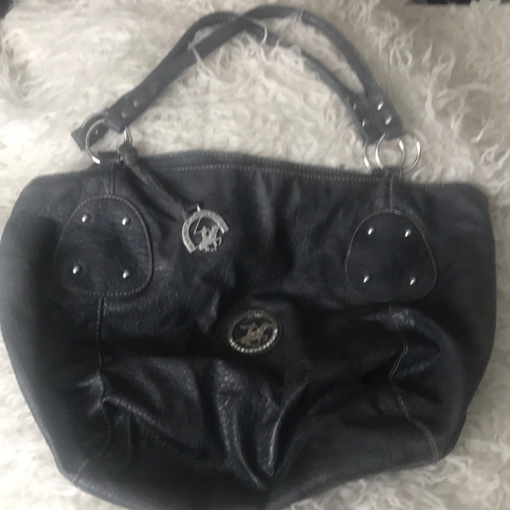 Beverly Hills PC bag. Used slightly. Great bag & straps stay on shoulder.